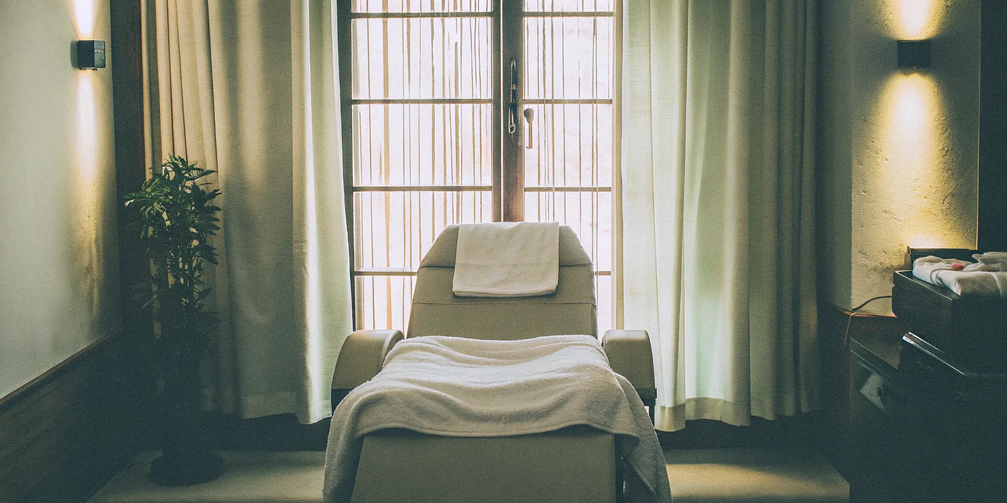 Treatment room with technology for non-surgical fat reduction and skin tightening.