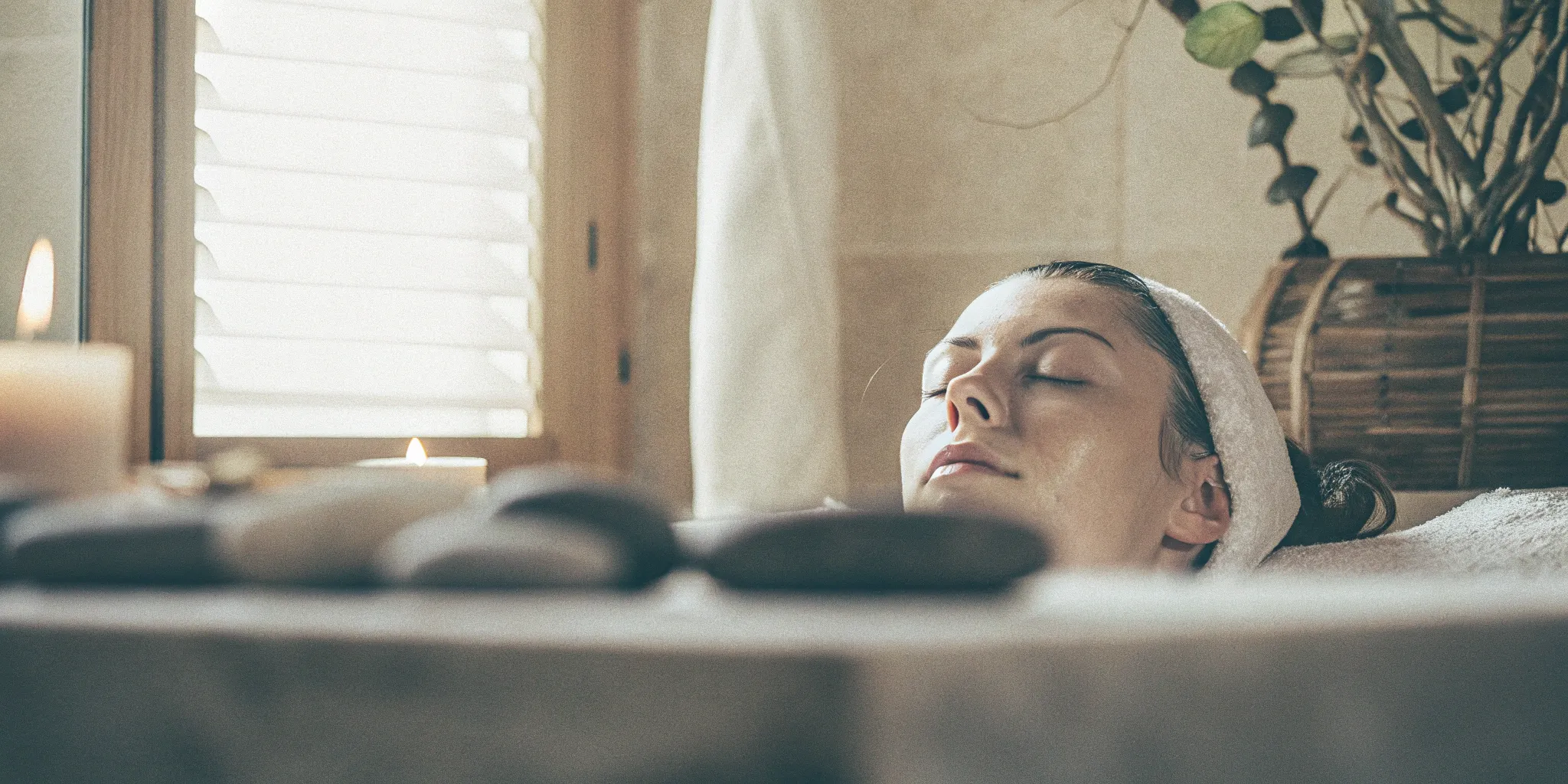 A woman with eyes closed getting the best chemical peel for wrinkles from a professional.